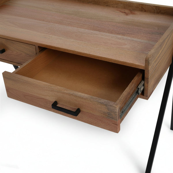 Wooden desk with an open drawer on a white background