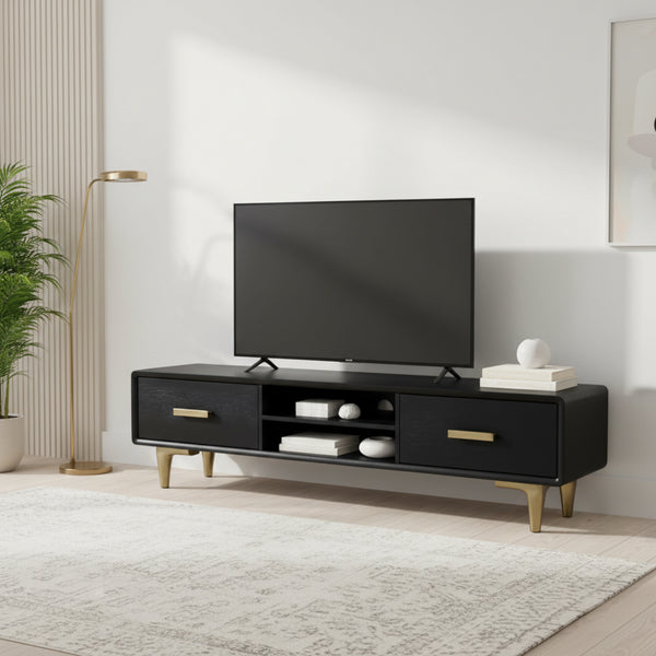 Black TV stand with a television in a modern living room setting.