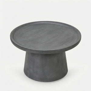 Round concrete table on a white background
