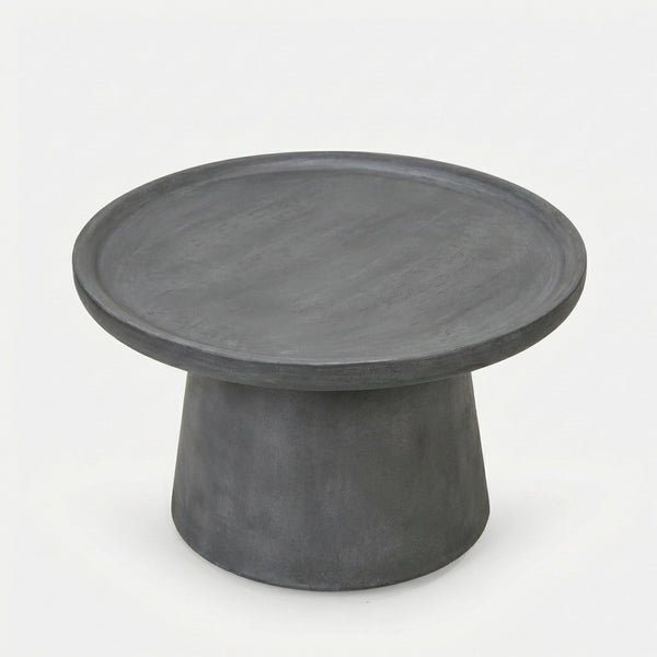 Round concrete table on a white background