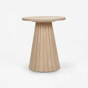 Wooden side table with a round top and fluted cylindrical base on a white background