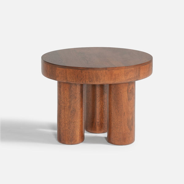 Wooden side table with a round top and cylindrical legs on a white background