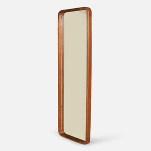 Long rectangular mirror with a wooden frame on a white background