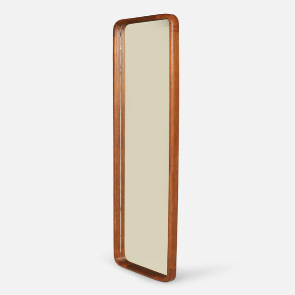 Long rectangular mirror with a wooden frame on a white background