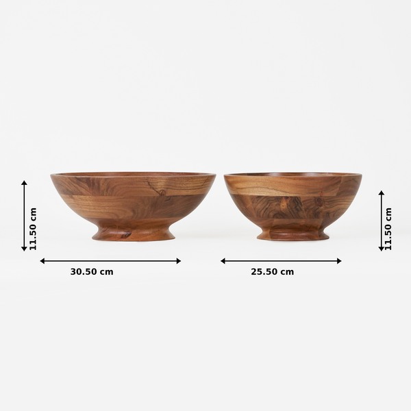 Two wooden bowls with measurements on a white background