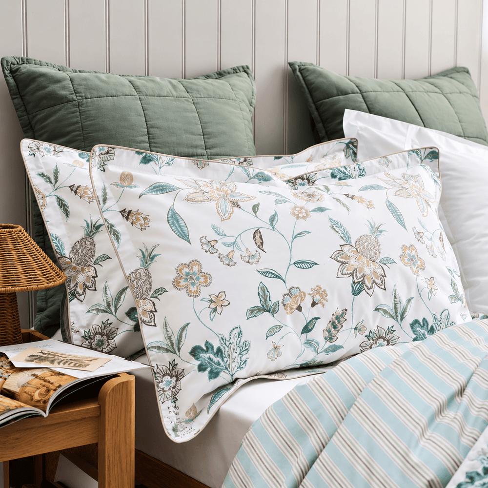Premium soft furnishings with decorative cushions and bedding at Homelves UAE